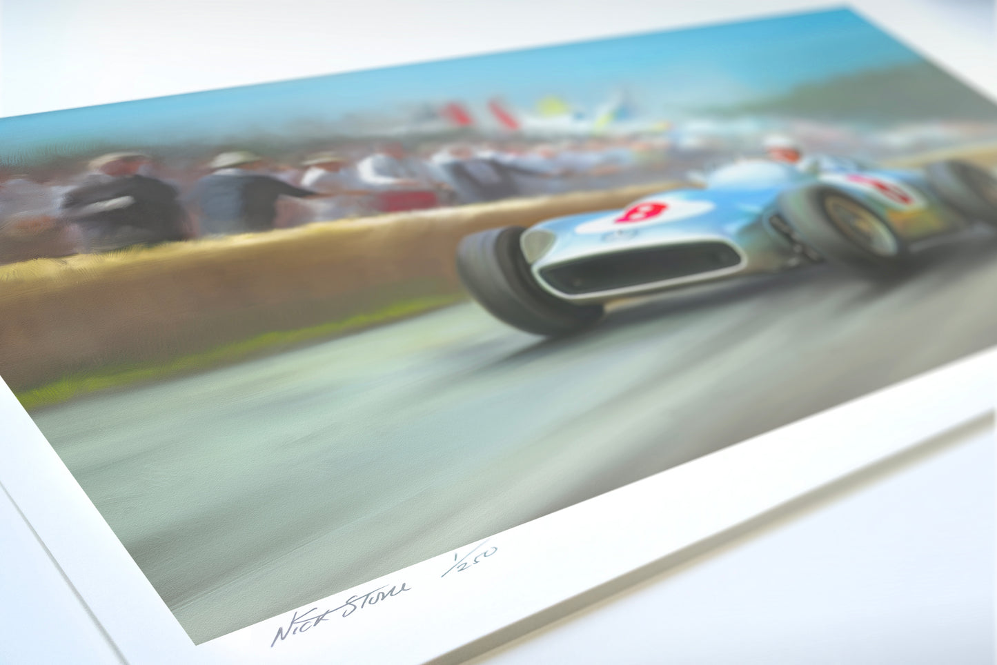 A painting of Stirling Moss driving the Mercedes Silver Arrow.